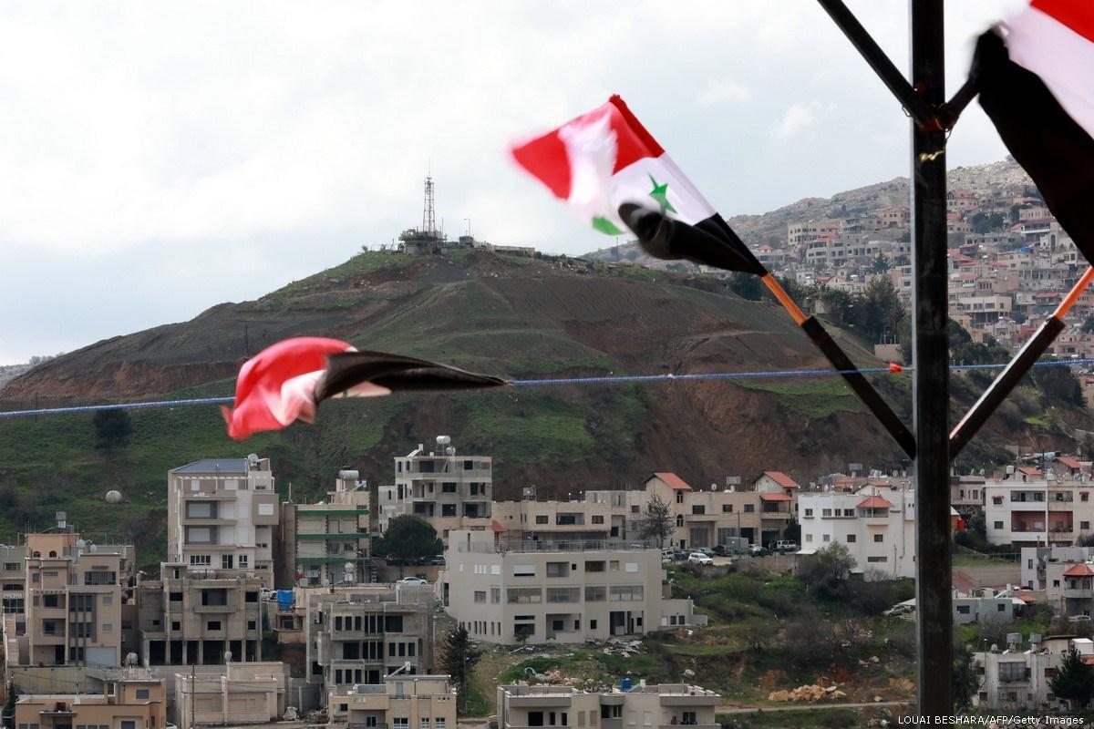 #23 - Main news thread - conflicts, terrorism, crisis from around the globe - Page 32 Syrian-national-flags-are-flown-in-golan-hieghtsGettyImages-1132913127