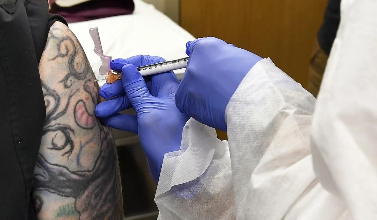 A patient in the US state of New York is injected with a possible Covid-19 vaccine in the world’s largest clinical study. Photo: AP