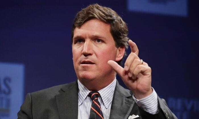 This image has an empty alt attribute; its file name is tucker-carlson-2-700x420.jpg