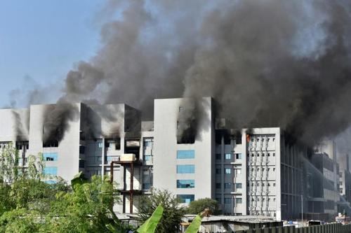 AFP photo of India's Serum Institute engulfed in flames on Thursday.
